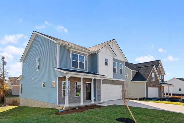 exterior space with brick siding, a porch, a garage, a residential view, and a front lawn