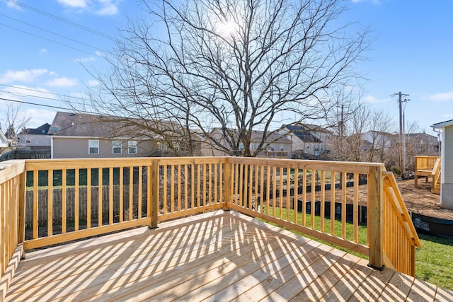 wooden terrace with a residential view