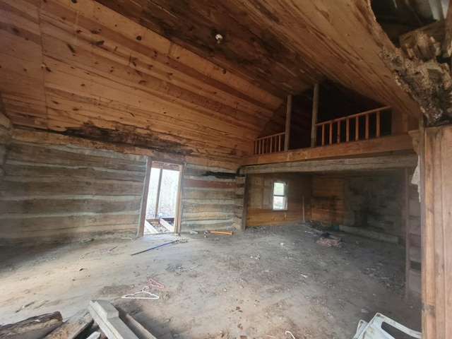 miscellaneous room featuring high vaulted ceiling