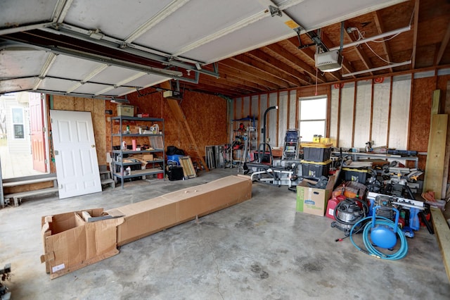 garage featuring a garage door opener