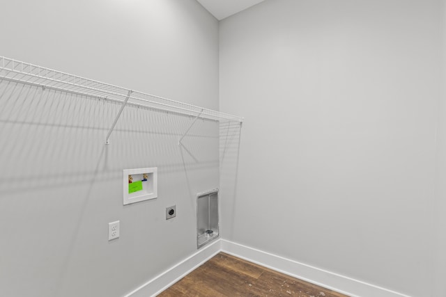 laundry room featuring hookup for a washing machine, dark wood-type flooring, and hookup for an electric dryer