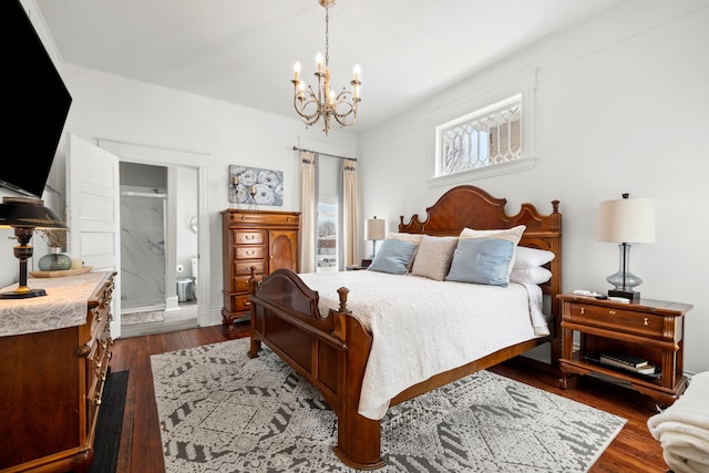 bedroom with a notable chandelier and dark hardwood / wood-style flooring