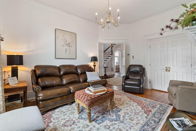 424 S 4th St, Danville, KY 40422 - living area featuring stairs, wood finished floors, a chandelier, and ornamental molding