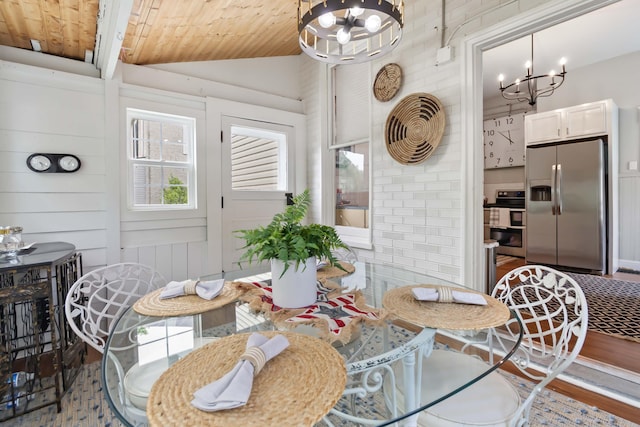 424 S 4th St, Danville, KY 40422 - dining space with a chandelier, wood finished floors, wooden ceiling, and vaulted ceiling
