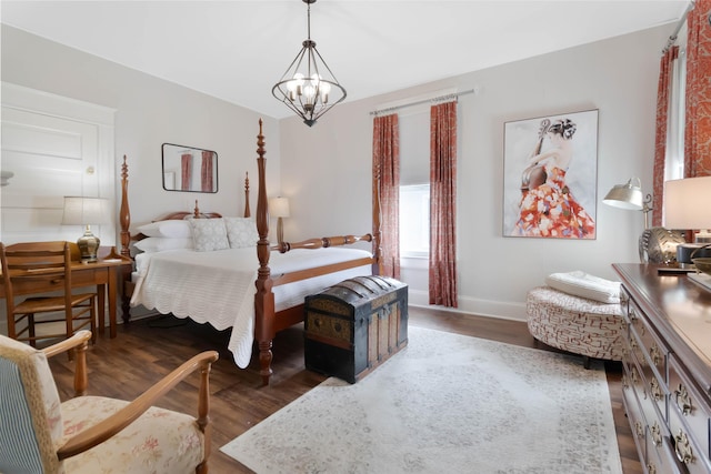 424 S 4th St, Danville, KY 40422 - bedroom with a chandelier, dark wood finished floors, and baseboards