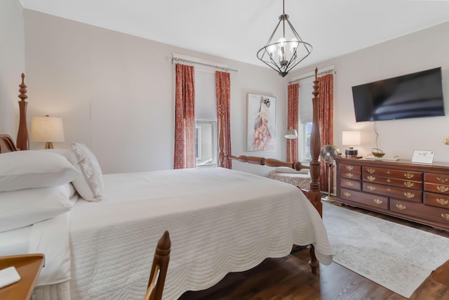 424 S 4th St, Danville, KY 40422 - bedroom with a chandelier and wood finished floors