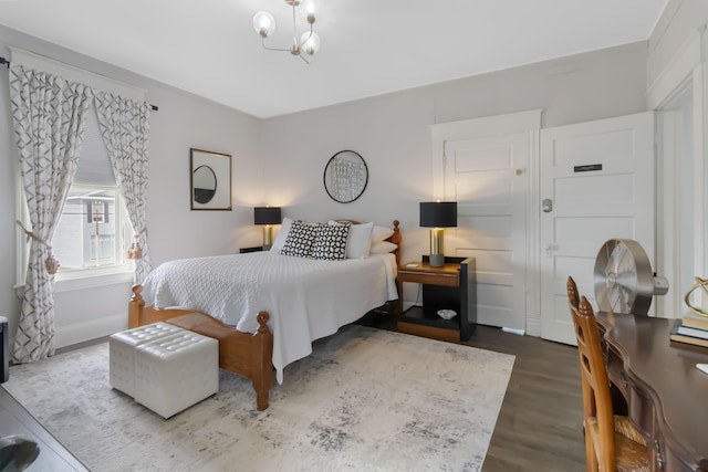 424 S 4th St, Danville, KY 40422 - bedroom with wood finished floors, a chandelier, and baseboards
