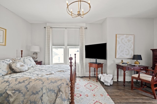 bedroom featuring a chandelier and dark hardwood / wood-style floors