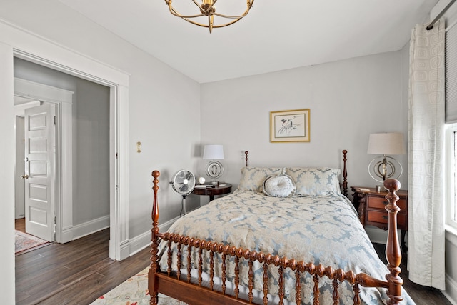 bedroom featuring dark hardwood / wood-style flooring