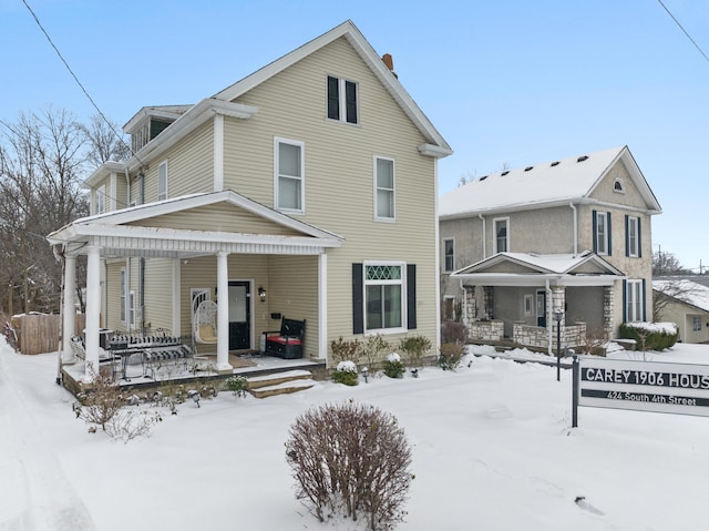 front of property featuring covered porch