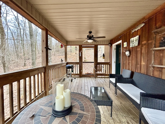 wooden deck with ceiling fan