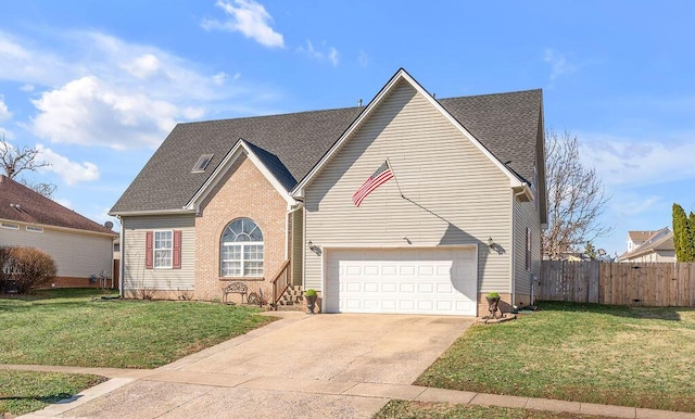 view of front of property with brick siding, concrete driveway, fence, a garage, and a front lawn