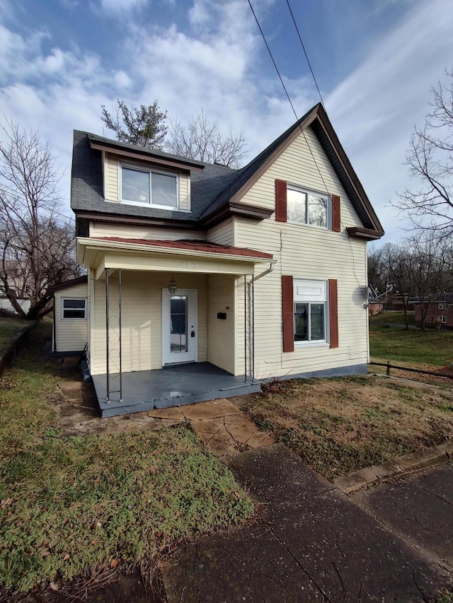 view of front of property featuring covered porch