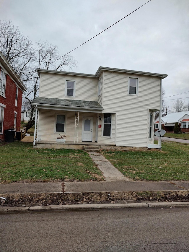 view of front property featuring a porch and a front lawn