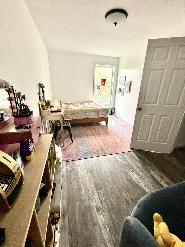 bedroom featuring dark hardwood / wood-style floors