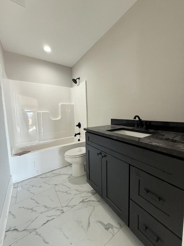 full bathroom with shower / bathing tub combination, vanity, and toilet