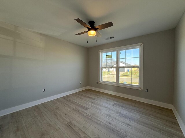 empty room with light wood-type flooring