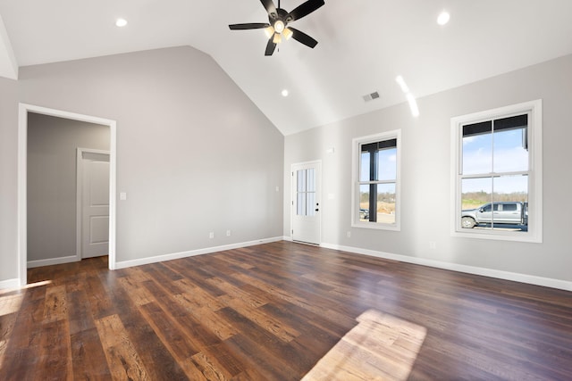 unfurnished living room featuring dark hardwood / wood-style floors, ceiling fan, and lofted ceiling