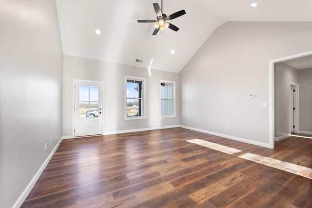 unfurnished living room featuring ceiling fan, high vaulted ceiling, and dark wood-type flooring