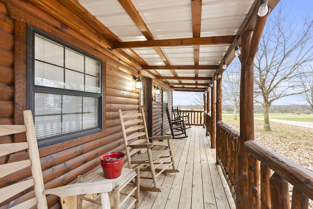 wooden deck featuring covered porch