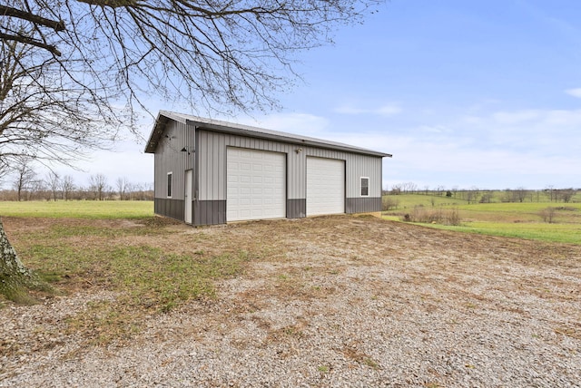 garage with a rural view