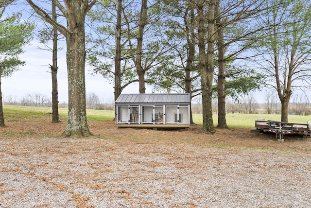 exterior space featuring an outdoor structure