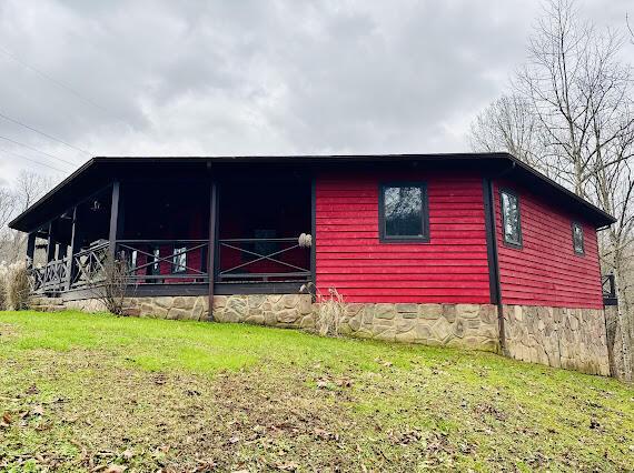 view of home's exterior featuring a lawn