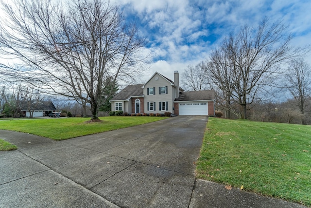 view of front facade with a front lawn and a garage