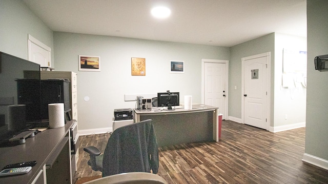 home office featuring dark hardwood / wood-style flooring