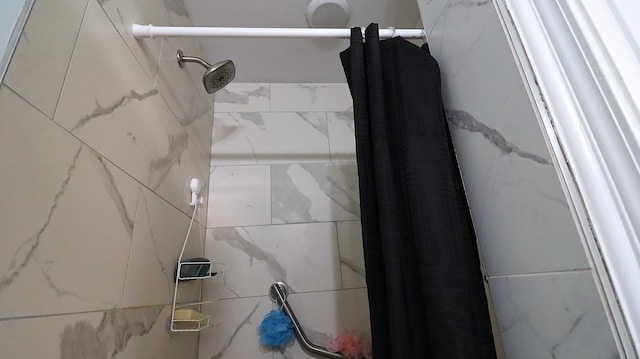 interior details featuring walk in shower