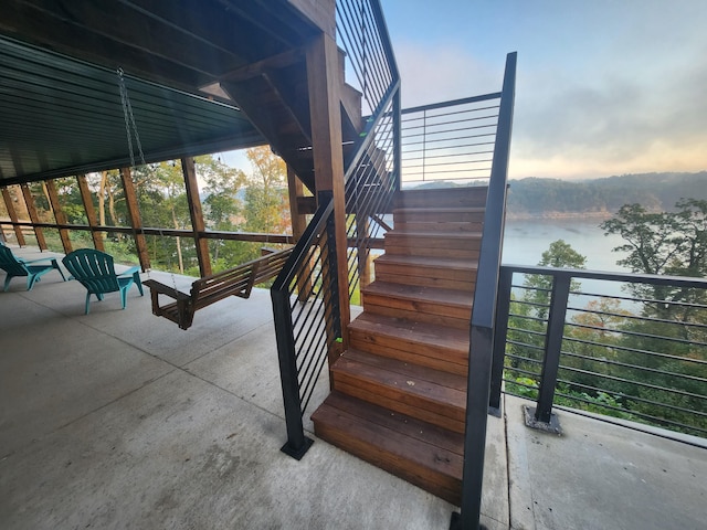 view of patio featuring a water view