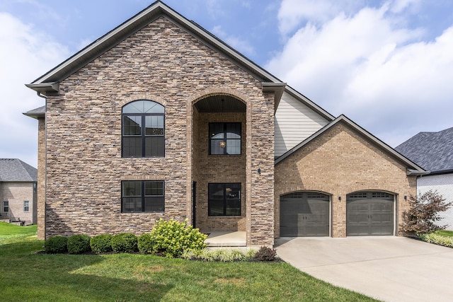 view of front facade with brick siding, concrete driveway, a garage, stone siding, and a front lawn