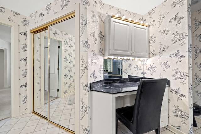 office area with light tile patterned floors