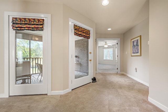 corridor with light carpet