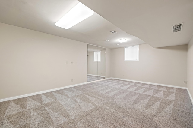 basement featuring carpet floors