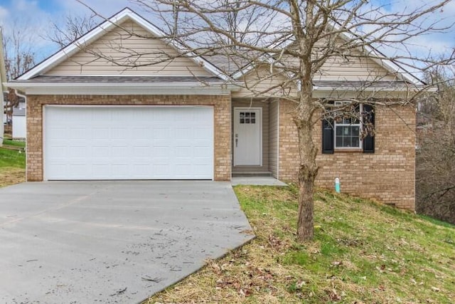 view of front of property featuring a garage