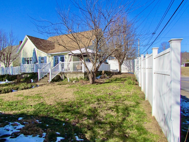 view of yard featuring a wooden deck