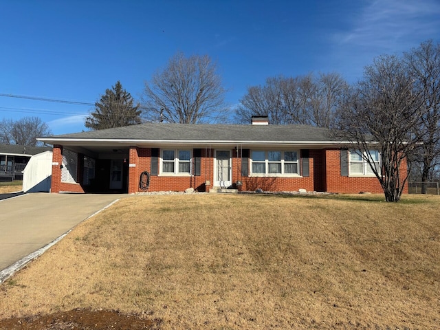 ranch-style home with a front yard and a carport