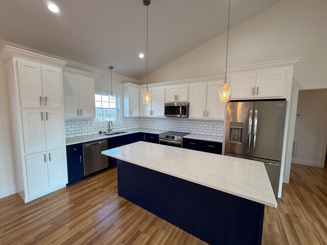 modern inspired farmhouse featuring central AC unit, a garage, and a front lawn