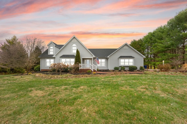 view of front of house featuring a lawn