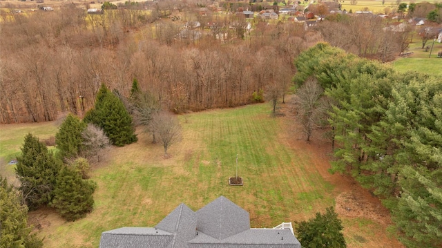 birds eye view of property with a rural view