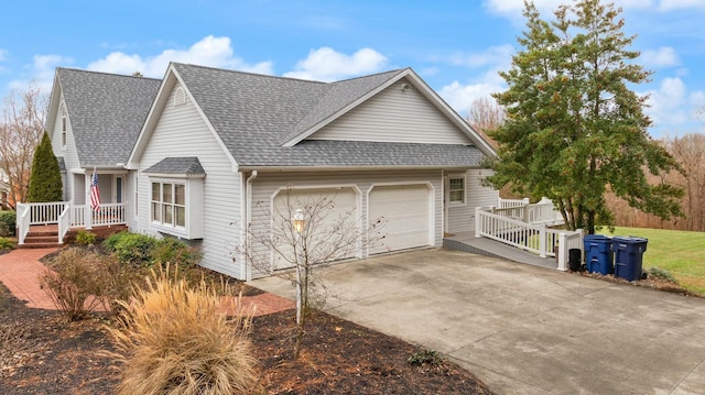 view of property exterior featuring a porch and a garage