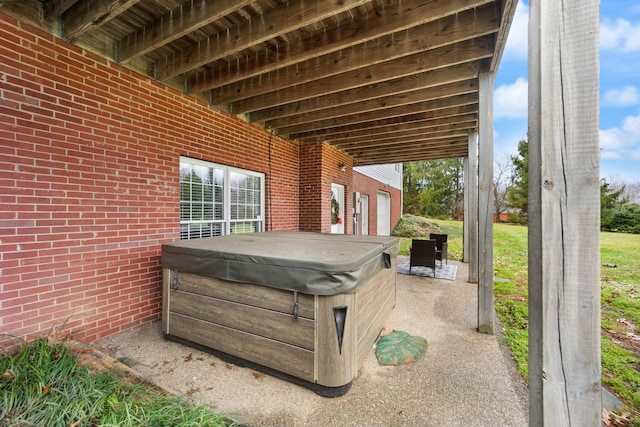 view of patio featuring a hot tub