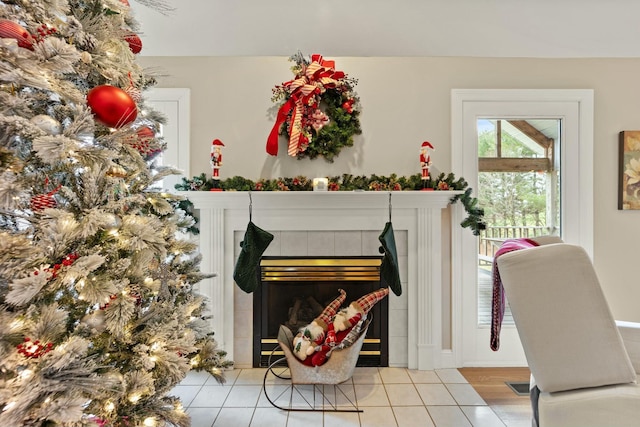 details with a tile fireplace