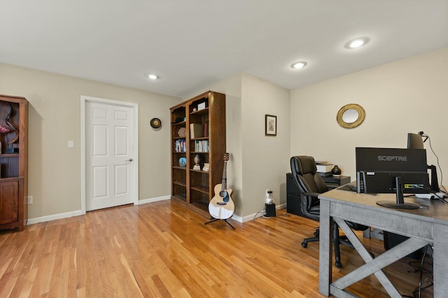 home office featuring light hardwood / wood-style flooring