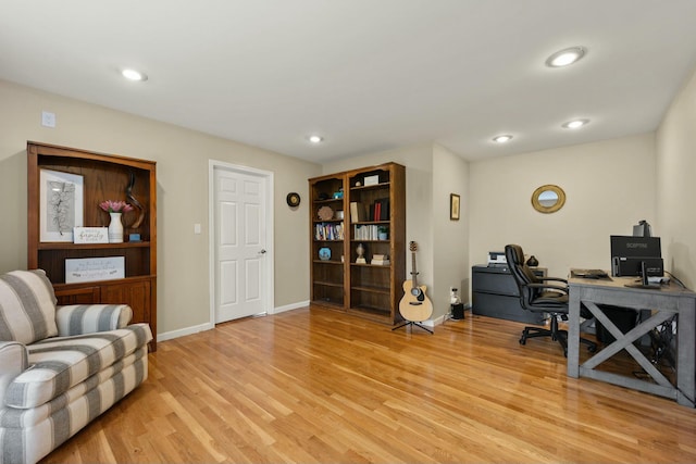 office area with light wood-type flooring