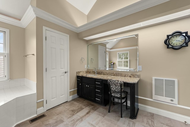 bathroom featuring crown molding, vanity, and lofted ceiling