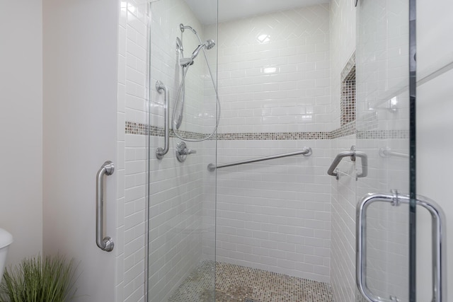 bathroom featuring walk in shower