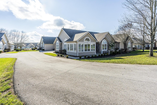 exterior space with a front yard