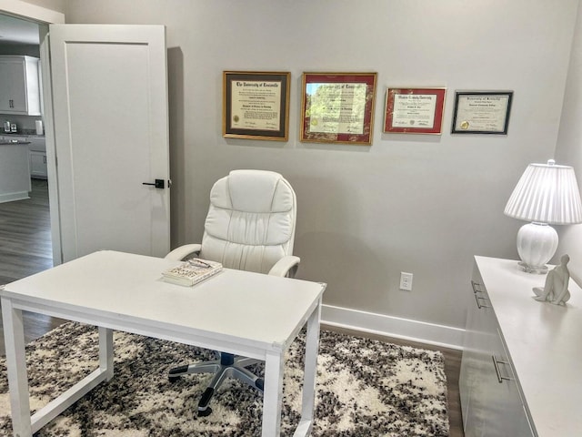 office space with hardwood / wood-style flooring